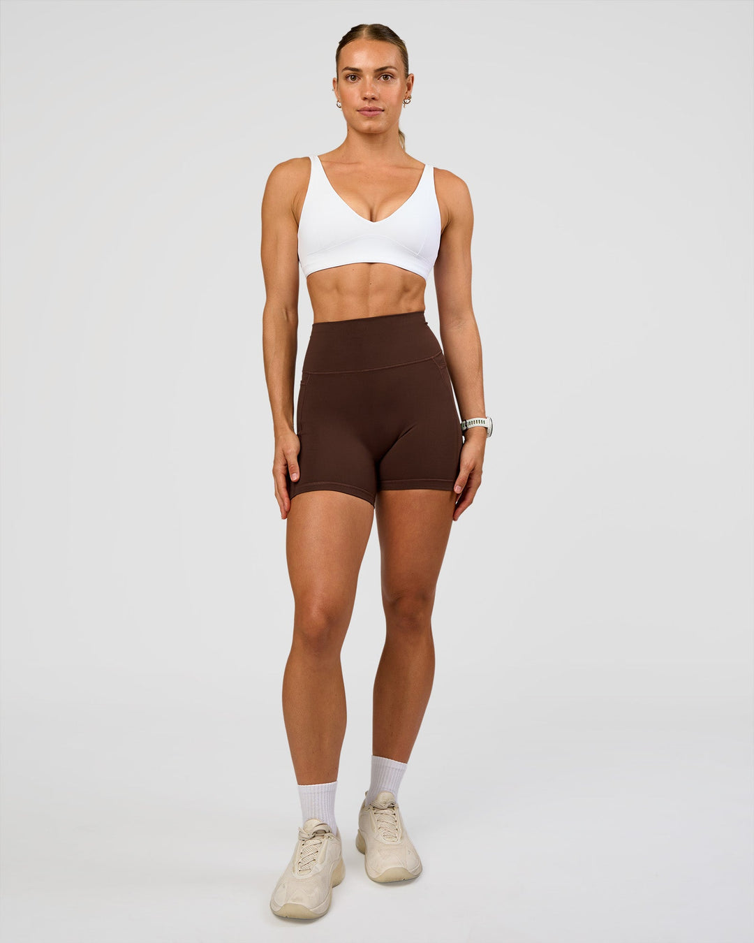 Woman wearing Vitality Sports Bra - White | Model:Maja | Size:XS