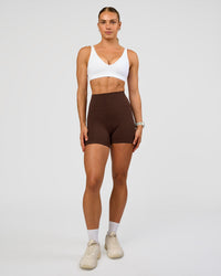 Woman wearing Vitality Sports Bra - White | Model:Maja | Size:XS