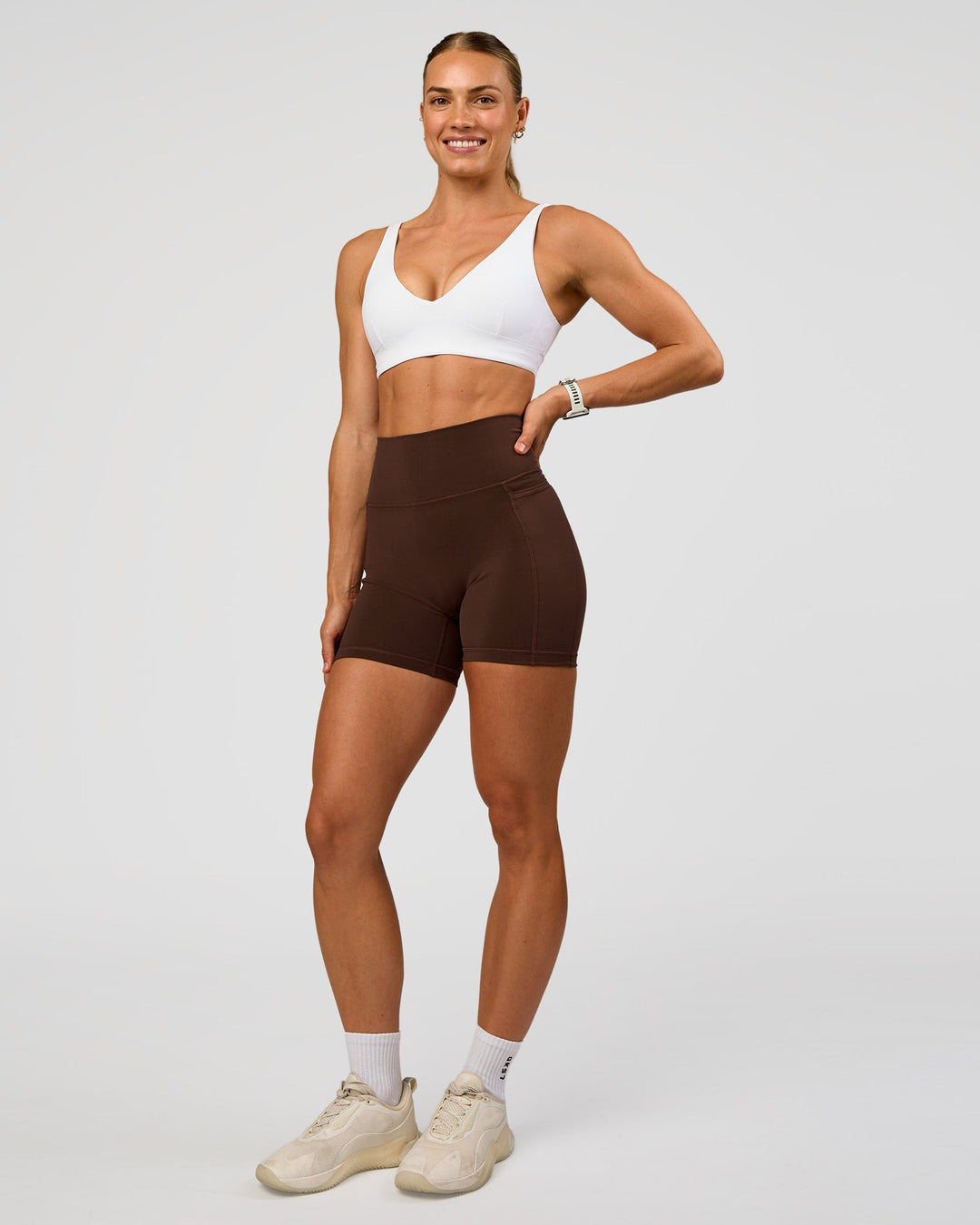 Woman wearing Vitality Sports Bra - White | Model:Maja | Size:XS