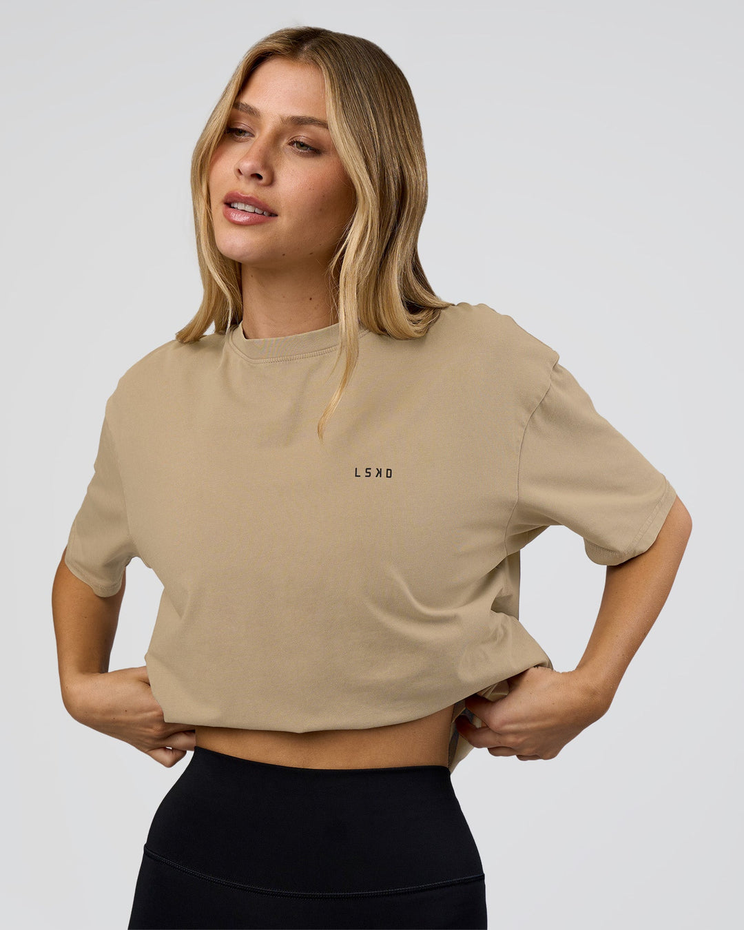Woman wearing We Love This  FLXCotton Oversized Tee - Greige Washed-Black | Model:Leilani | Size:XS