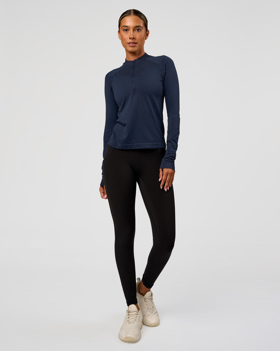 Woman wearing AeroFLX+ Long Sleeve Half Zip - Future Navy/Future Navy | Model:Charli | Size:XS - view 5