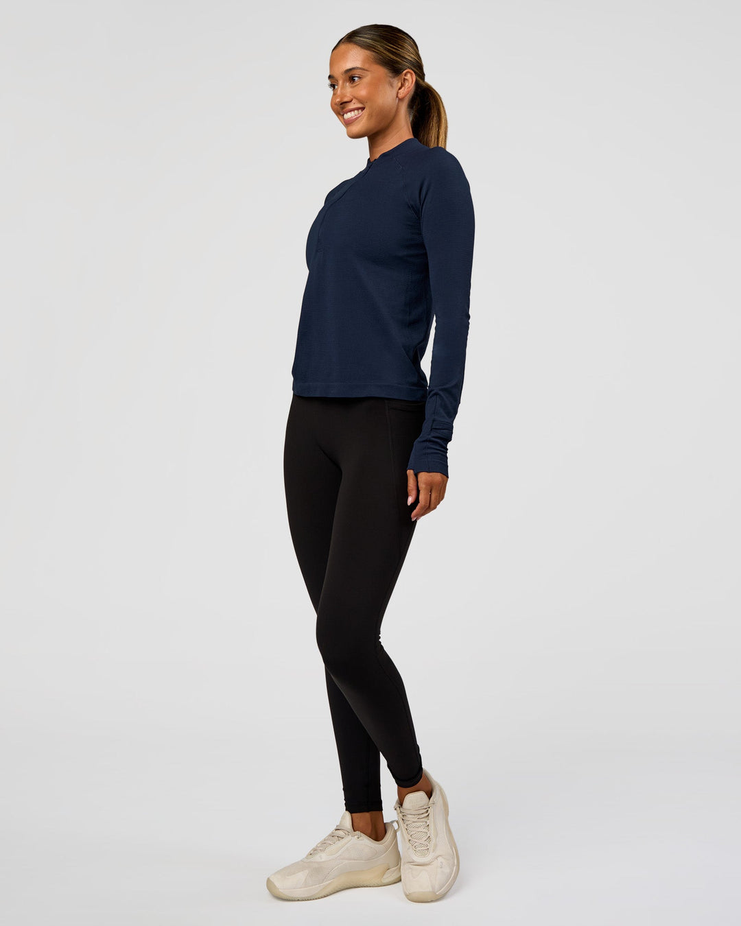 Woman wearing AeroFLX+ Long Sleeve Half Zip - Future Navy/Future Navy | Model:Charli | Size:XS - view 2
