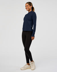 Woman wearing AeroFLX+ Long Sleeve Half Zip - Future Navy/Future Navy | Model:Charli | Size:XS | Thumbnail Index: 1