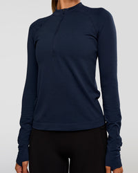 Woman wearing AeroFLX+ Long Sleeve Half Zip - Future Navy/Future Navy | Model:Charli | Size:XS | Thumbnail Index: 3