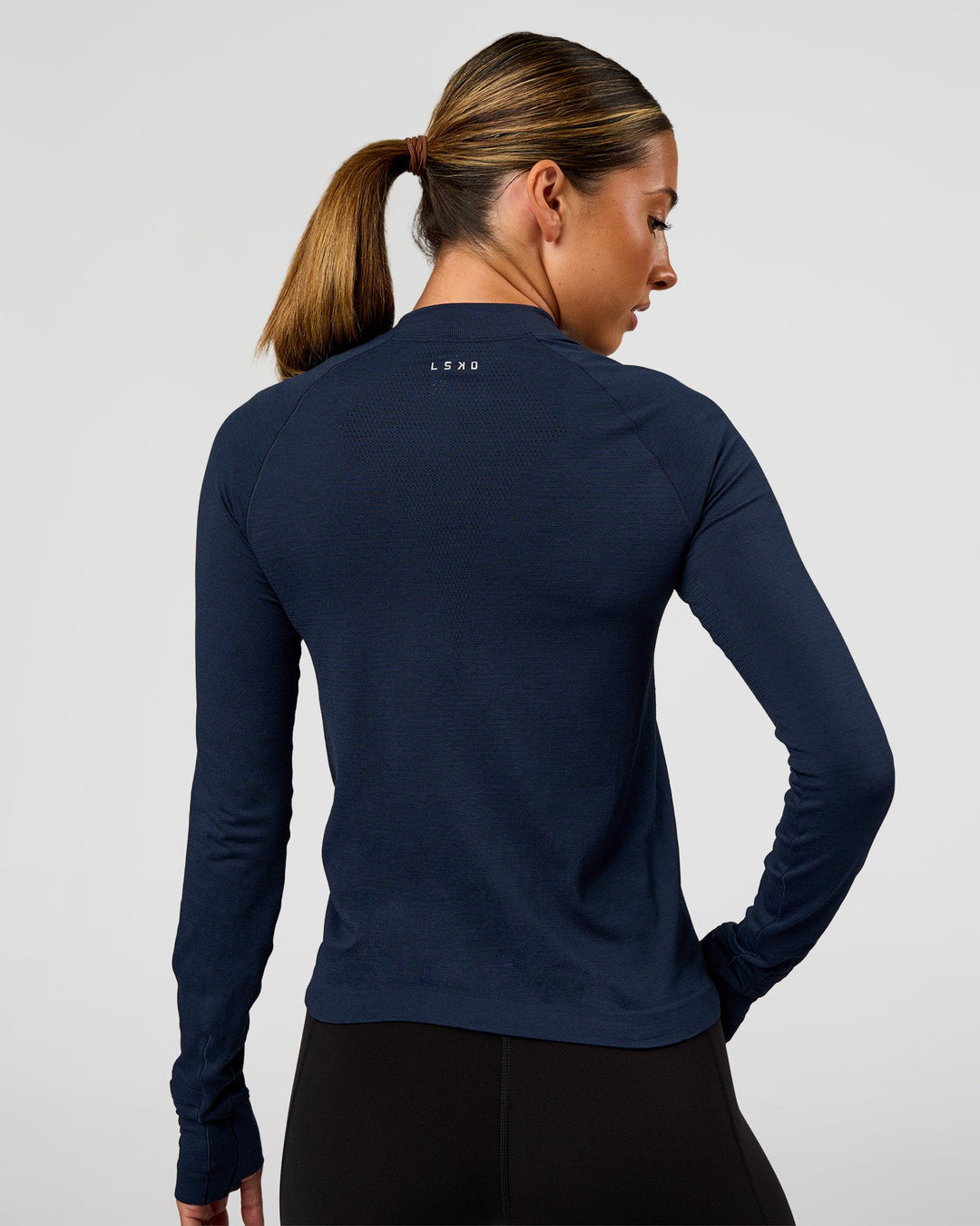Woman wearing AeroFLX+ Long Sleeve Half Zip - Future Navy/Future Navy | Model:Charli | Size:XS - view 3