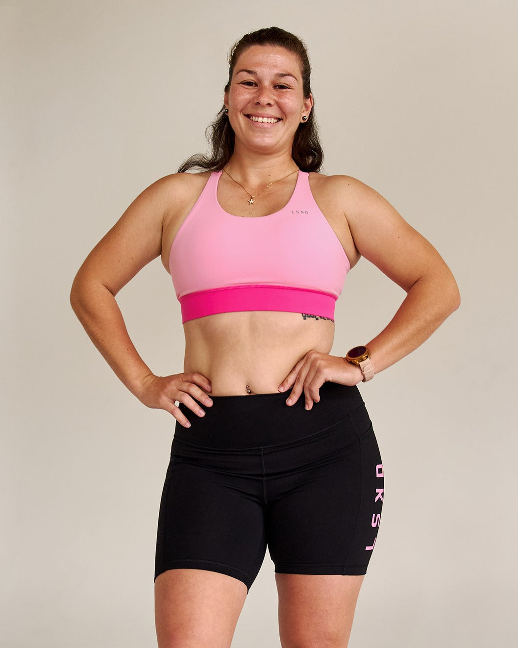 Campaign image of Accelerate Split Strap Sports Bra - Pink Rose-Ultra Pink - view 7