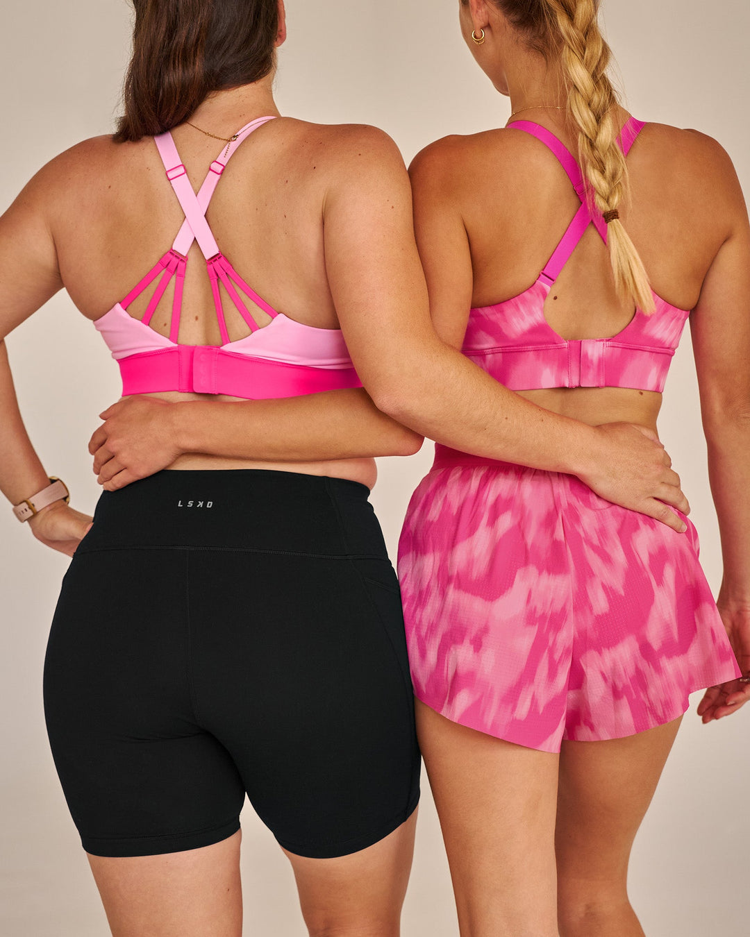 Campaign image of Accelerate Split Strap Sports Bra - Pink Rose-Ultra Pink - view 5