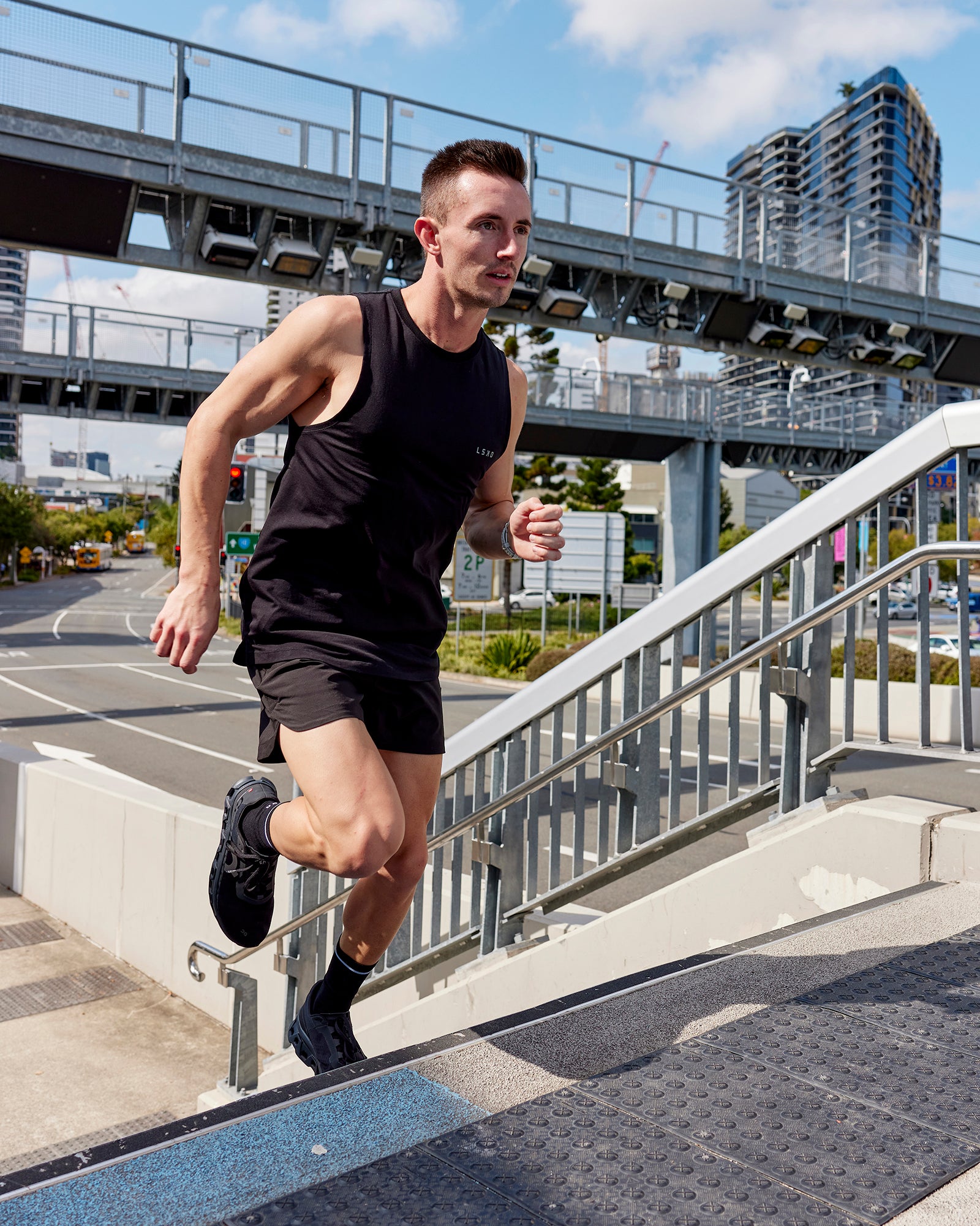 Man wearing Competition 5" Performance Short - Black