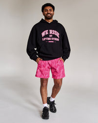 Campaign image of Rep 7" Performance Short - Radiant Pink | Thumbnail Index: 1