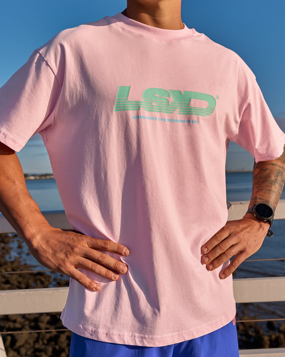 Campaign image of Sideline FLXCotton Oversized Tee - Marshmallow-Jelly Mint - view 1