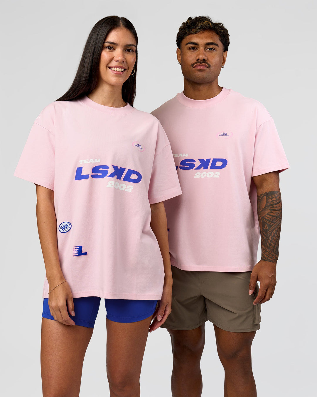 Duo wearing League Heavyweight FLXCotton Oversized Tee - Marshmallow-Power Cobalt | Model:Xav | Size:L | Model:Rhiley | Size:XS - view 1