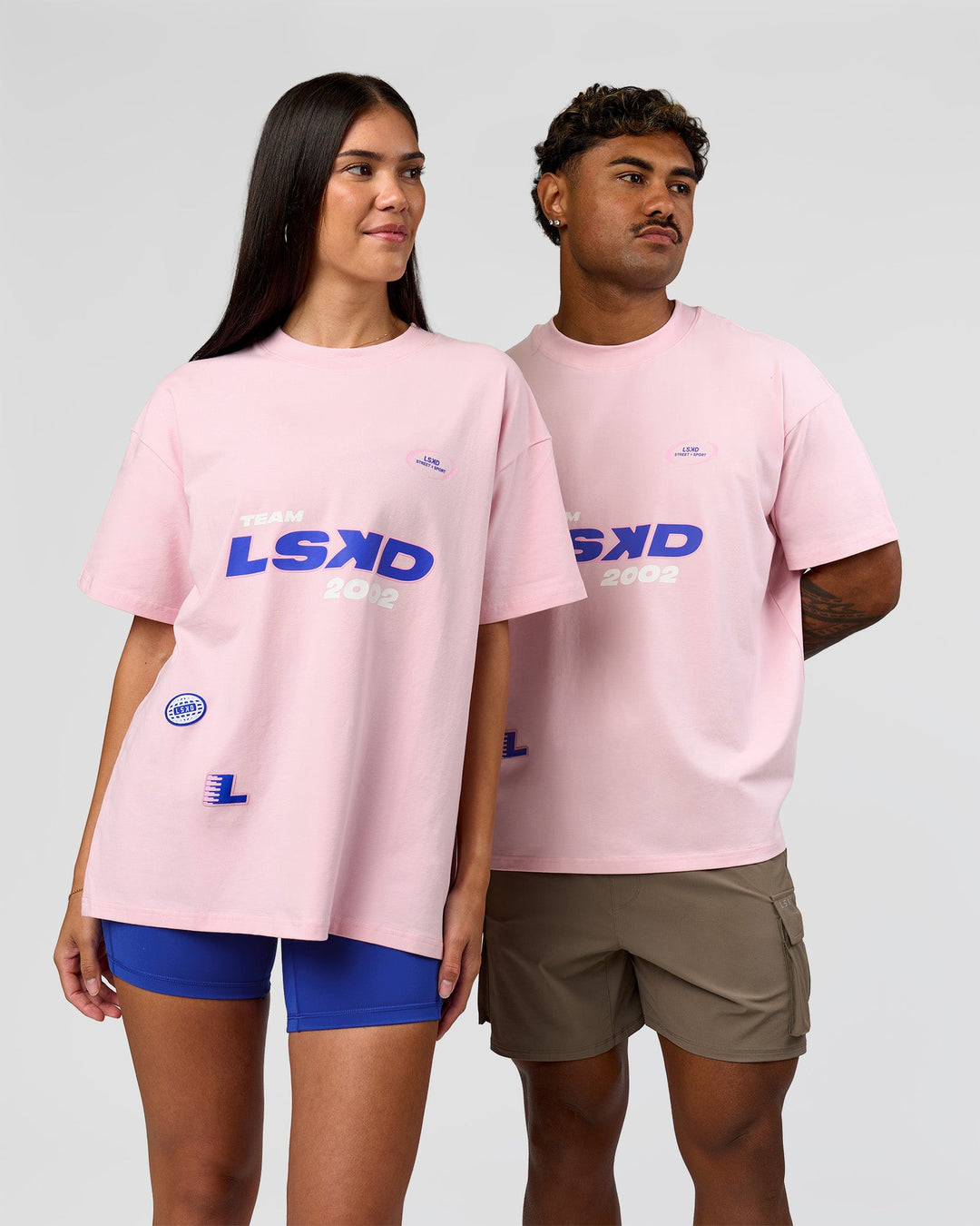 Duo wearing League Heavyweight FLXCotton Oversized Tee - Marshmallow-Power Cobalt | Model:Xav | Size:L | Model:Rhiley | Size:XS - view 12