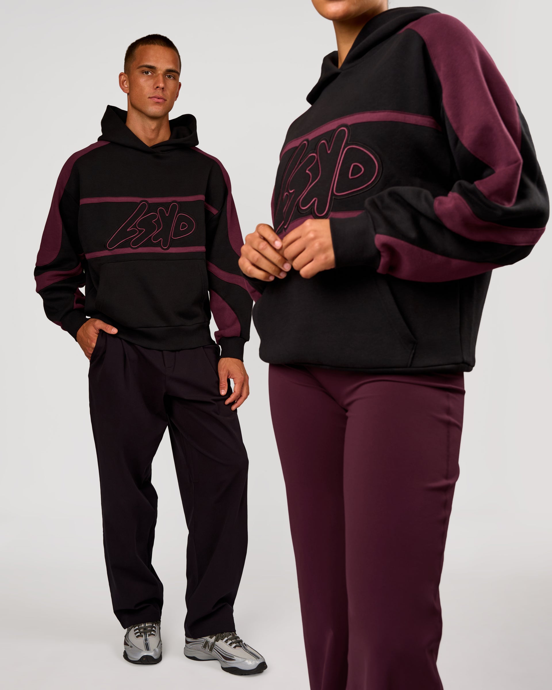 Duo wearing Vibe Oversized Hoodie - Black-Cherry Lacquer | Model:Albert | Size:M | Model:Rosie | Size:S