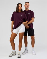 Duo wearing Coffee Run FLXCotton Oversized Tee - Cherry Lacquer-Black | Model:Albert | Size:M | Model:Bianca | Size:XS | Thumbnail Index: 3