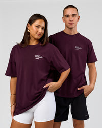 Duo wearing Coffee Run FLXCotton Oversized Tee - Cherry Lacquer-Black | Model:Albert | Size:M | Model:Bianca | Size:XS | Thumbnail Index: 9