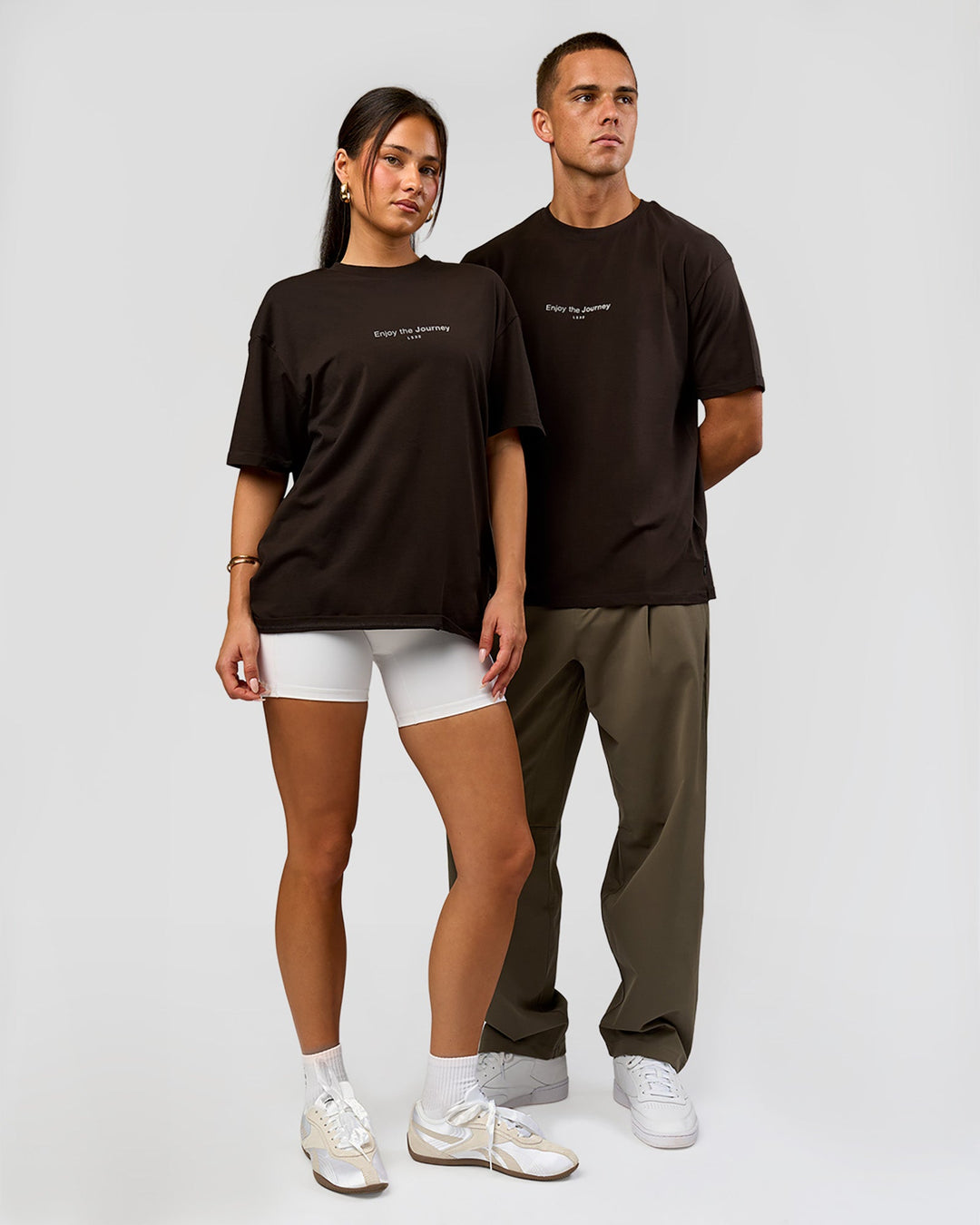 Duo wearing VS1 Enjoy The Journey FLXCotton Oversize Tee - Ground Coffee | Model:Albert | Size:M | Model:Bianca | Size:XS - view 8