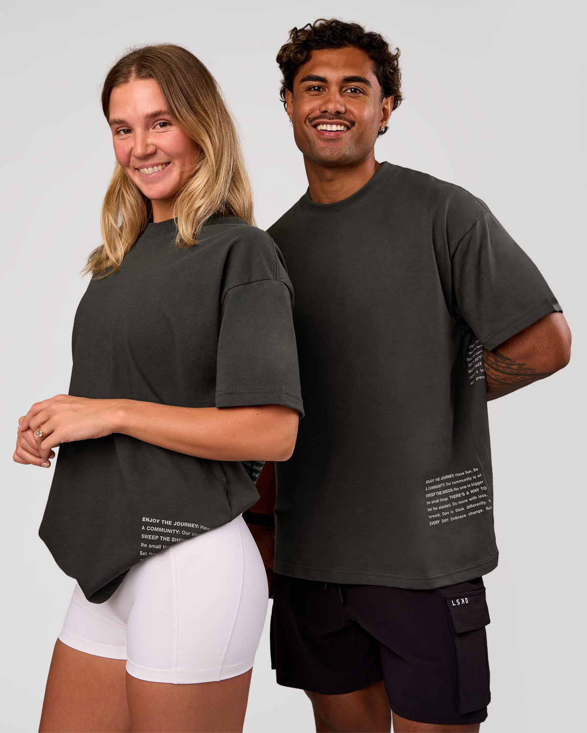 Duo wearing Block Heavyweight Oversized Tee  - Onyx-Alloy | Model:Amity | Size:S | Model:Xav | Size:L