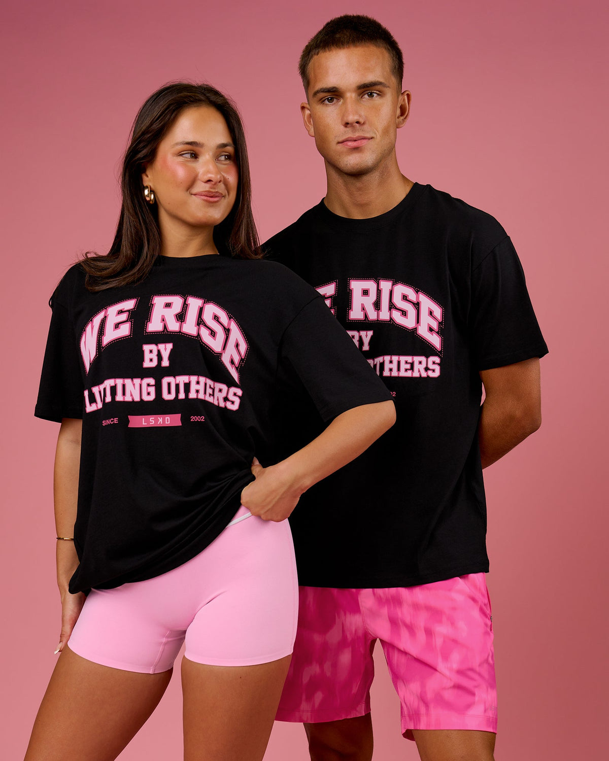 Duo wearing BCAM FLXCotton Graphic Oversized Tee - Black | Model:Bianca | Size:S | Model:Albert | Size:M