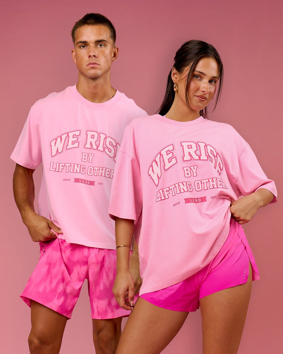 Duo wearing BCAM Heavyweight FLXCotton Graphic Boxed Tee - Pink Rose | Model:Bianca | Size:S | Model:Albert | Size:M