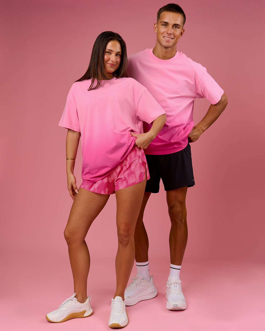 Duo wearing BCAM Ombre Heavyweight FLXCotton Oversized Tee  - Pink Rose-Ultra Pink | Model:Bianca | Size:S | Model:Albert | Size:M - view 4