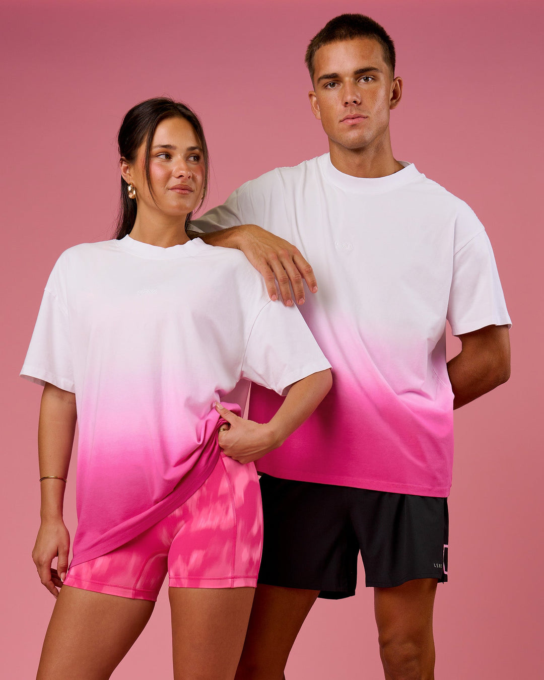 Duo wearing BCAM Ombre Heavyweight FLXCotton Oversized Tee  - White-Ultra Pink | Model:Bianca | Size:S | Model:Albert | Size:M - view 6