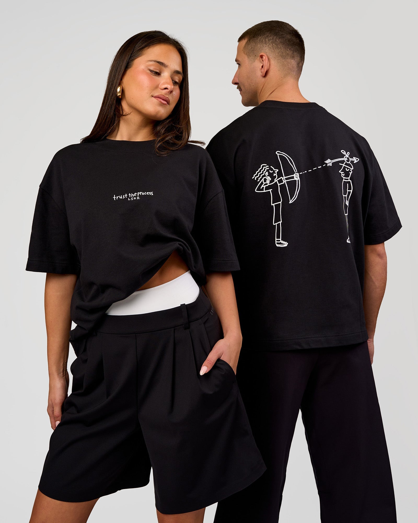 Duo wearing Andrew J. Steel x LSKD Heavyweight Boxed Tee - Black | Model:Bianca | Size:XS | Model:Jaiden | Size:L