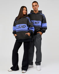 Duo wearing A-Team Oversized Hoodie - Onyx-Bluebell | Model:Bianca | Size:XS | Model:Albert | Size:M | Thumbnail Index: 1