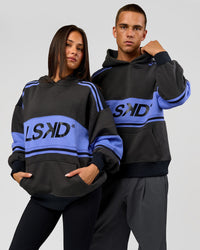 Duo wearing A-Team Oversized Hoodie - Onyx-Bluebell | Model:Bianca | Size:XS | Model:Albert | Size:M | Thumbnail Index: 2