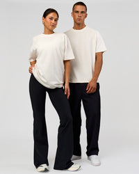 Duo wearing Tonal Legacy Heavyweight Oversized Tee - Off White-Off White | Model:Bianca | Size:XS | Model:Albert | Size:M | Thumbnail Index: 6