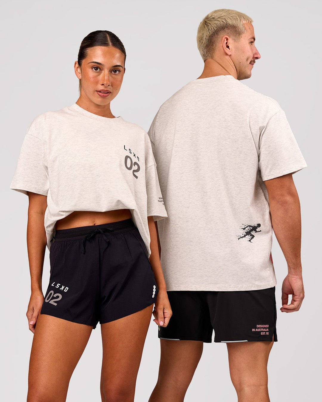 Duo wearing Hybrid Elements Heavyweight FLXCotton Oversized Tee  - Silver Marl | Model:Charli | Size:XS | Model:Jaiden | Size:L - view 1
