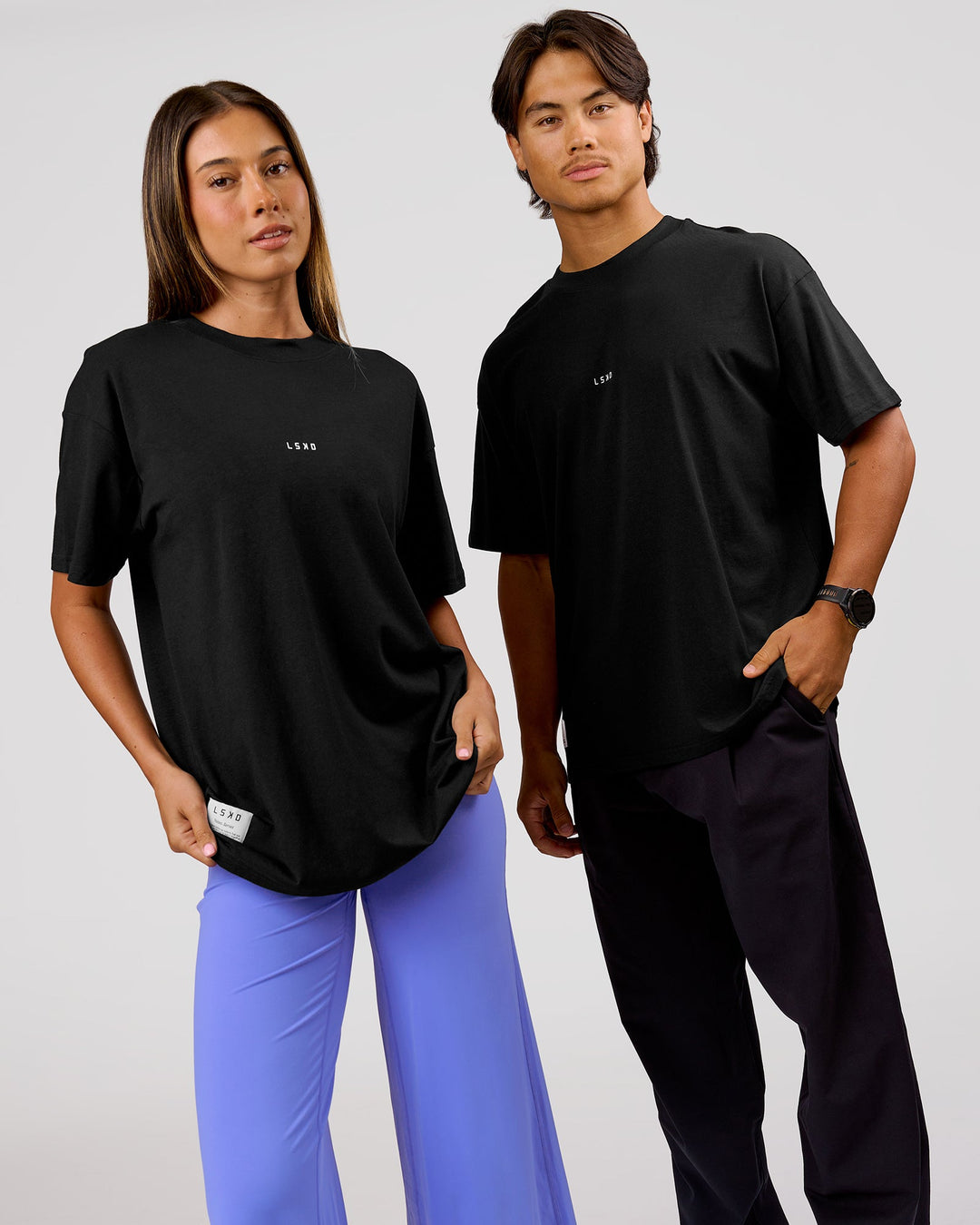 Duo wearing VS26 1% Better FLXCotton Oversize Tee - Black-White | Model:Charli | Size:XS | Model:George | Size:M - view 4
