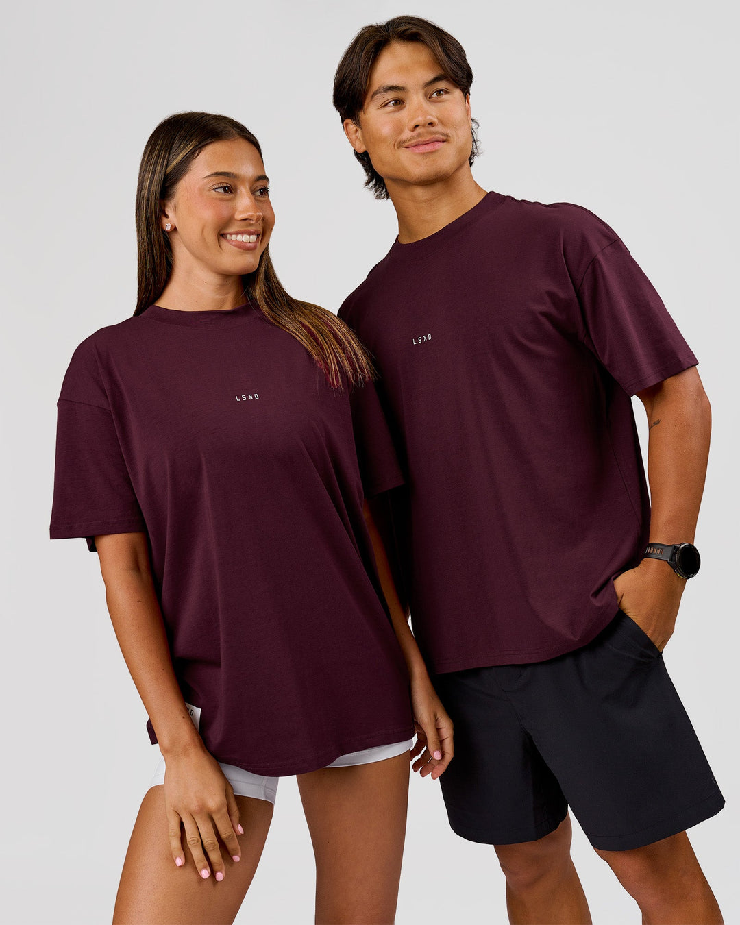 Duo wearing VS26 1% Better FLXCotton Oversize Tee - Cherry Lacquer-Off White | Model:Charli | Size:XS | Model:George | Size:M - view 4