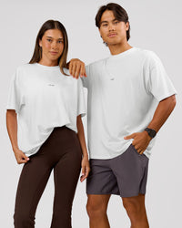 Duo wearing VS26 1% Better FLXCotton Oversize Tee - White-Black | Model:Charli | Size:XS | Model:George | Size:M | Thumbnail Index: 3