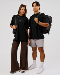 Duo wearing VS26 MFBS FLXCotton Oversize Tee - Black-White | Model:Charli | Size:XS | Model:George | Size:M | Thumbnail Index: 3
