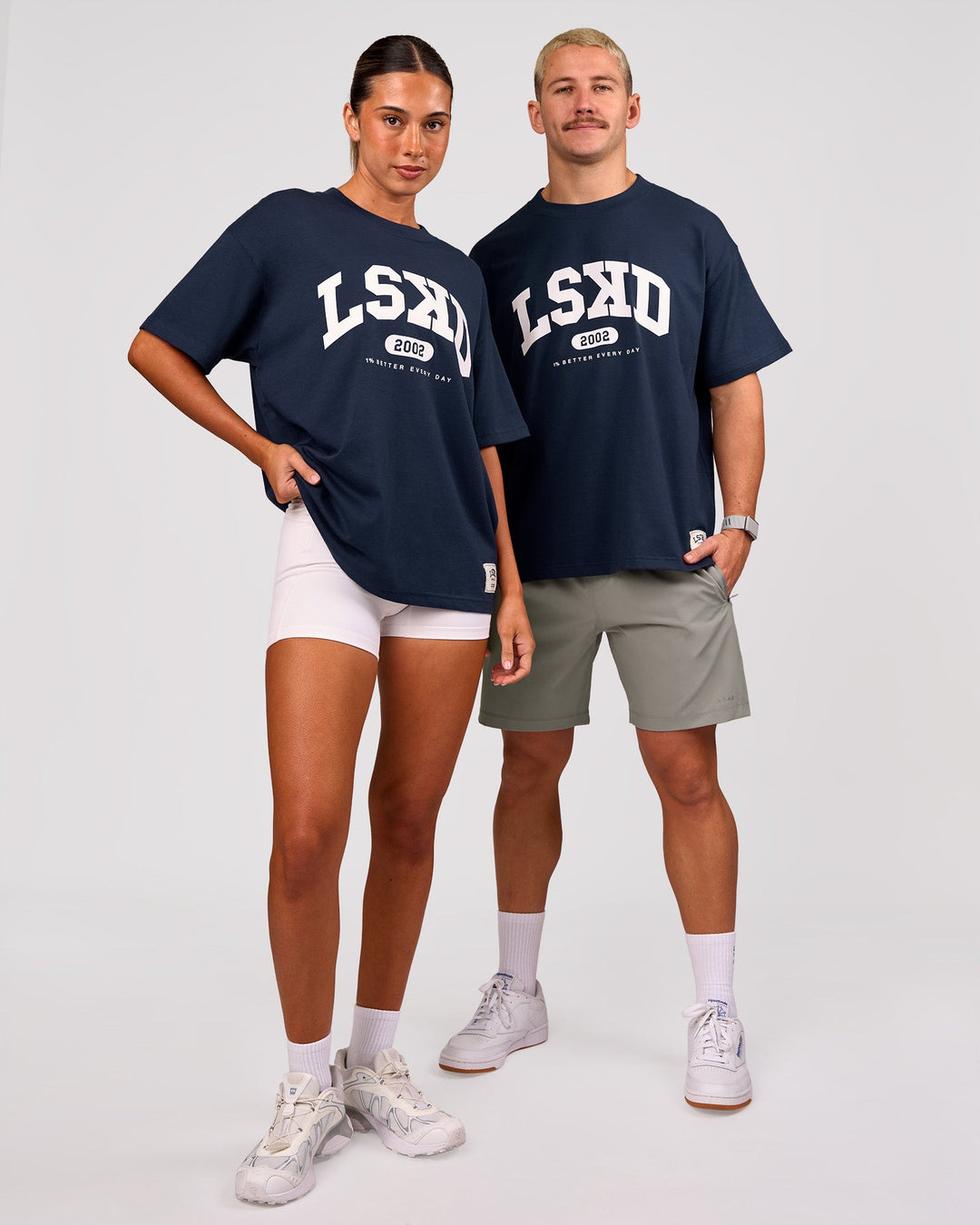 Duo wearing Varsity EST Heavyweight Oversized Tee  - Future Navy-White | Model:Charli | Size:XS | Model:Jaiden | Size:M - view 2