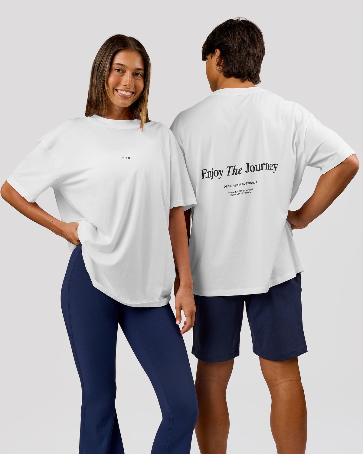 Duo wearing VS26 Journey FLXCotton Oversize Tee - White-Black | Model:Charli | Size:XS | Model:Journey | Size:VS26 - view 1