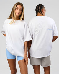 Duo wearing Strong is Beautiful Heavyweight Oversized Tee - White | Model:Georgia | Size:XS | Model:Malebo | Size:M | Thumbnail Index: 0