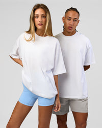Duo wearing Strong is Beautiful Heavyweight Oversized Tee - White | Model:Georgia | Size:XS | Model:Malebo | Size:M | Thumbnail Index: 2
