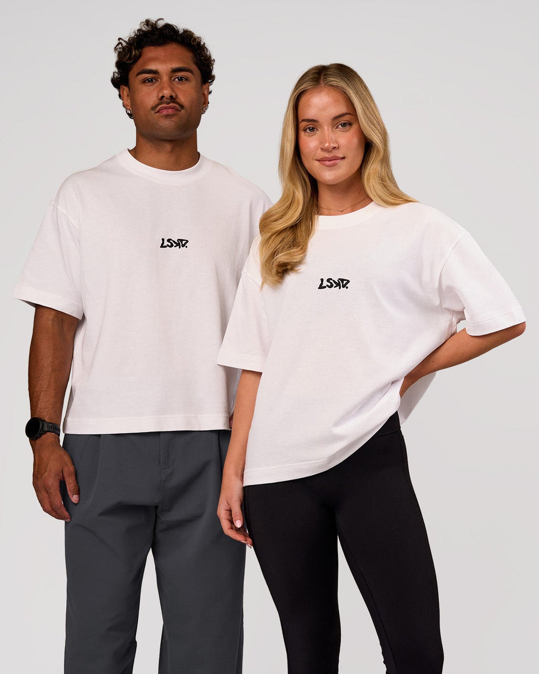 Duo wearing Progression Super Heavyweight Boxed Tee - White-Black | Model:Issy | Size:XS | Model:Xav | Size:L - view 1