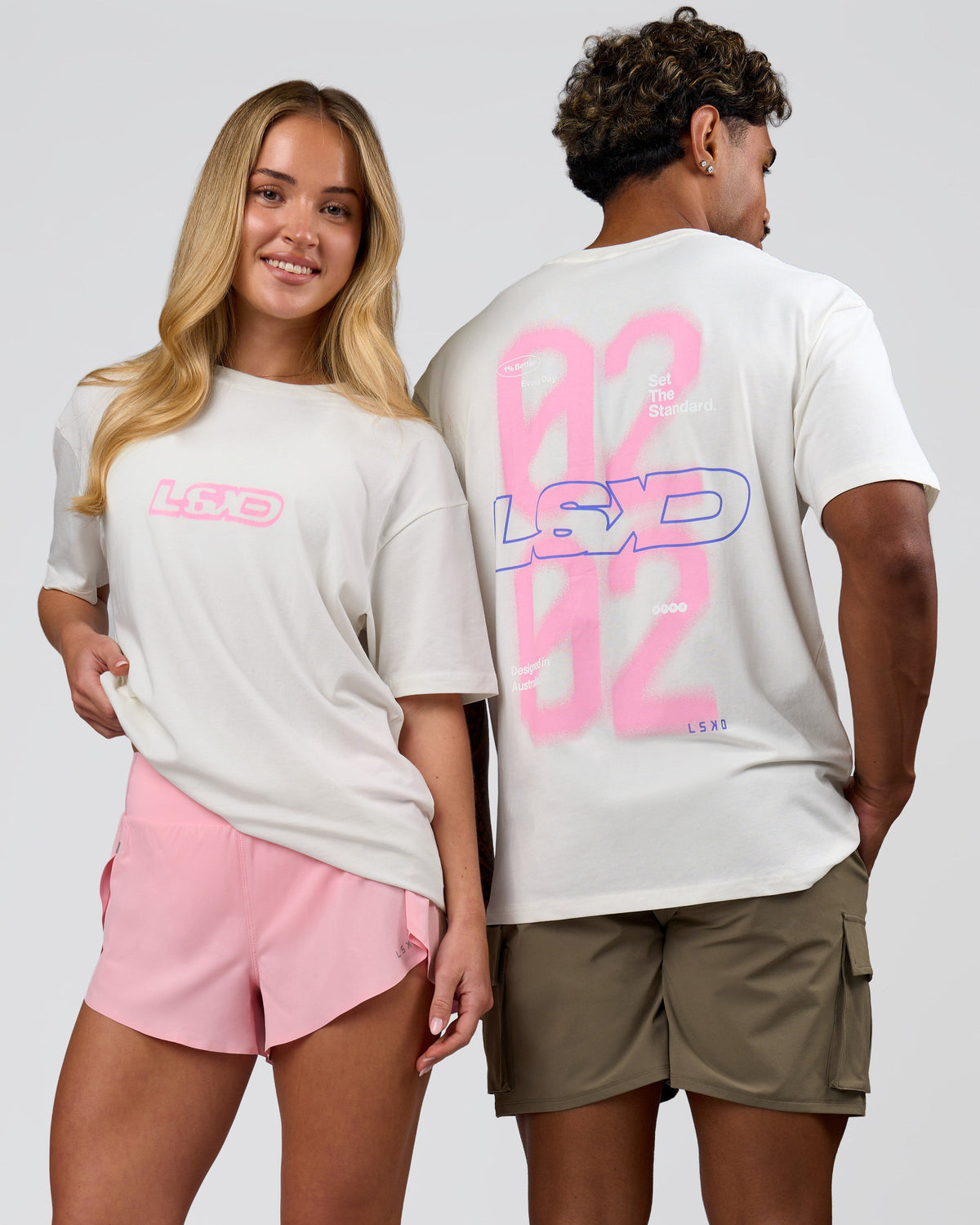 Duo wearing SoCal 26 FLXCotton Oversize Tee  - Off White-Pink Rose | Model:Issy | Size:XS | Model:Xav | Size:L - view 1