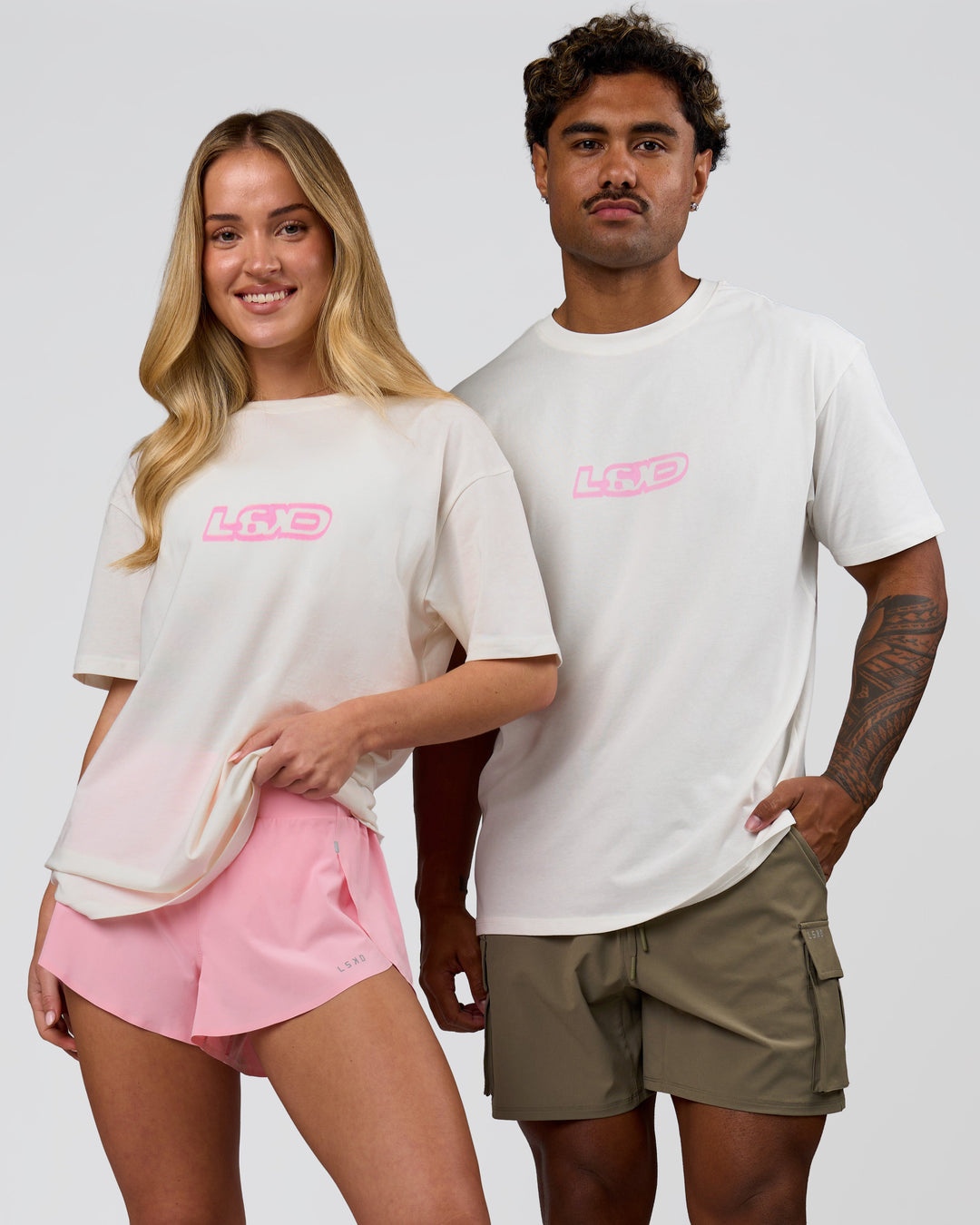 Duo wearing SoCal 26 FLXCotton Oversize Tee  - Off White-Pink Rose | Model:Issy | Size:XS | Model:Xav | Size:L - view 7