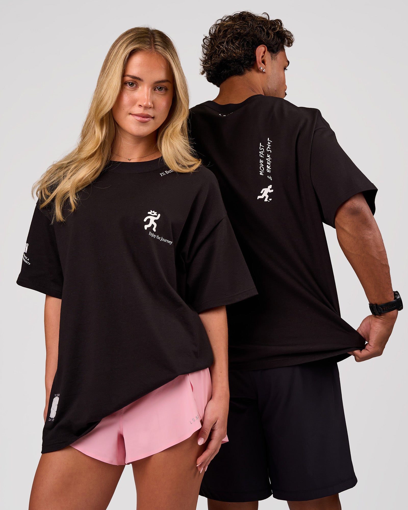 Duo wearing Values Manifesto Heavyweight Oversized Tee  - Black-White | Model:Issy | Size:XS | Model:Xav | Size:L