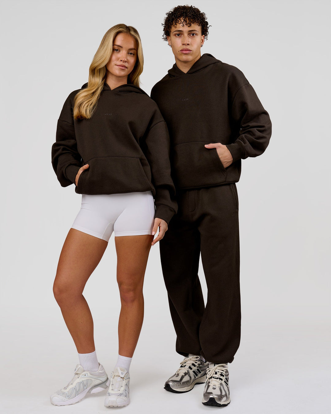 Duo wearing Base Oversized Hoodie - Ground Coffee | Model:Issy | Size:XS | Model:Leandro | Size:M - view 2
