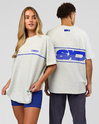 Duo wearing Inline Heavyweight FLXCotton Oversized Tee - Silver Marl-Power Cobalt | Model:Issy | Size:XS | Model:Leandro | Size:M | Thumbnail Index: 0