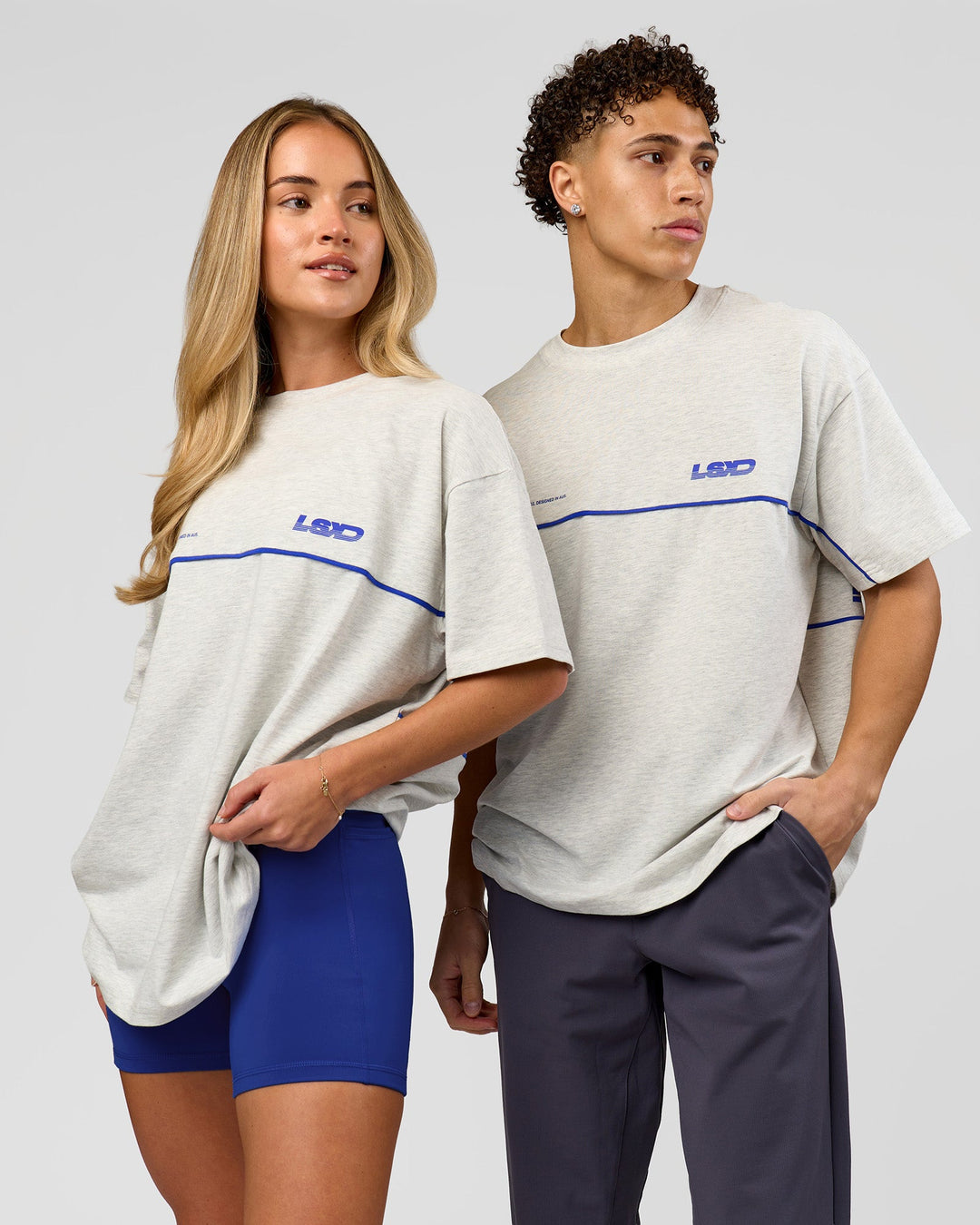Duo wearing Inline Heavyweight FLXCotton Oversized Tee - Silver Marl-Power Cobalt | Model:Issy | Size:XS | Model:Leandro | Size:M - view 2