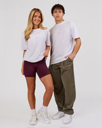 Duo wearing Magma FLXCotton Oversize Tee  - White-Pink Rose | Model:Issy | Size:XS | Model:Leandro | Size:M | Thumbnail Index: 6