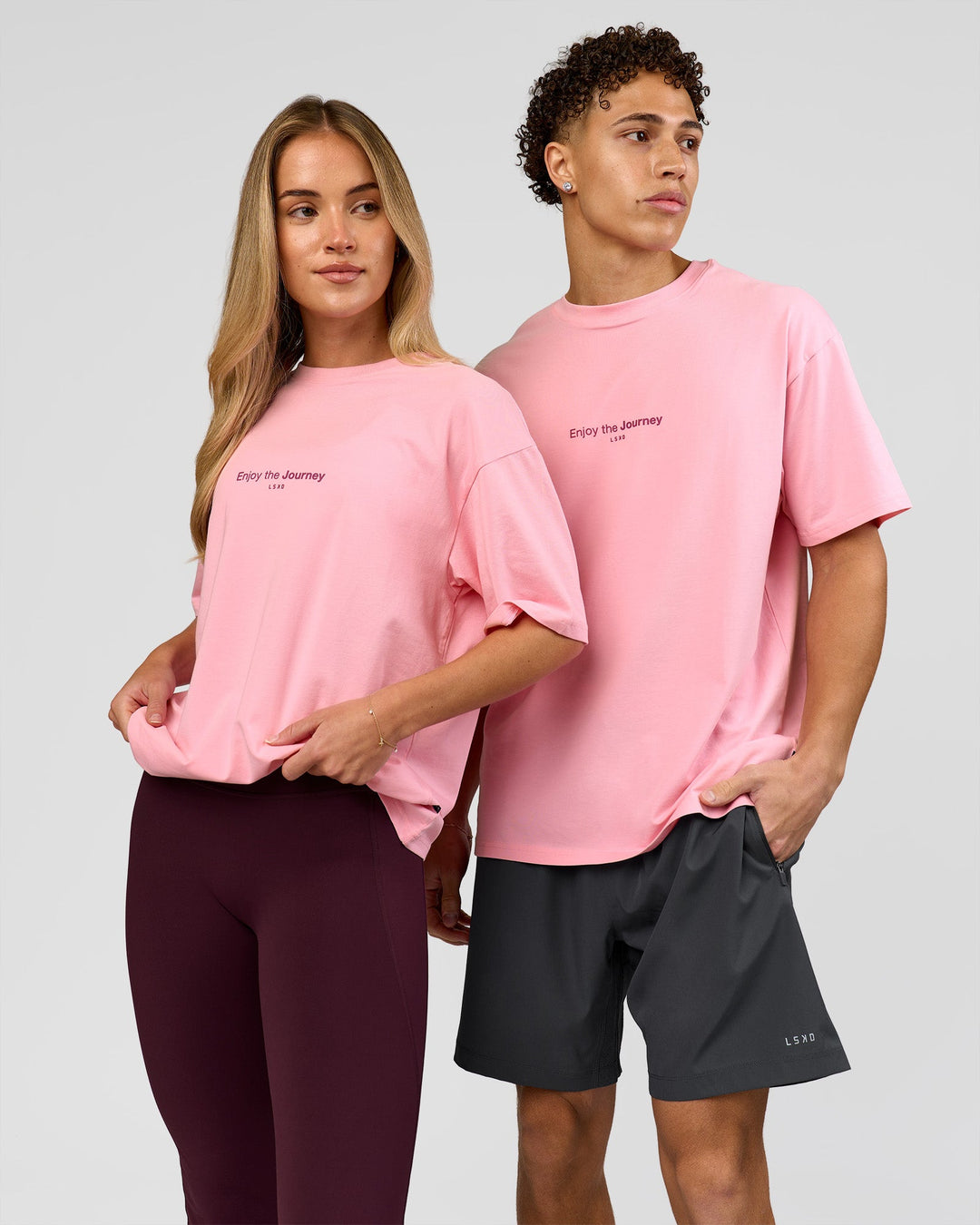 Duo wearing VS1 Enjoy The Journey FLXCotton Oversize Tee - Pink Rose | Model:Issy | Size:XS | Model:Leandro | Size:M - view 8