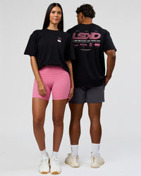 Duo wearing Archive FLXCotton Oversized Tee - Black-Candy Pink | Model:Rhiley | Size:XS | Model:Xav | Size:L | Thumbnail Index: 9