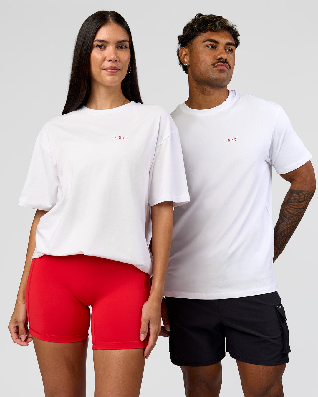 Duo wearing Dare To Think FLXCotton Tee Oversize - White-Scarlet | Model:Rhiley | Size:XS | Model:Xav | Size:L - view 2