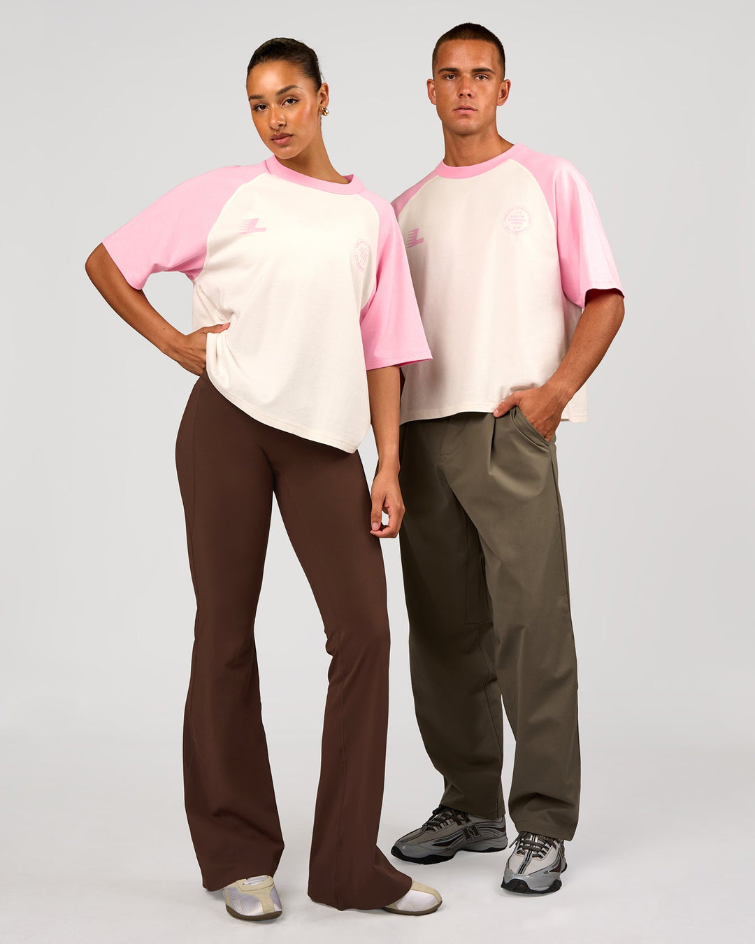 Duo wearing Victory Heavyweight Boxed Raglan Tee - Off White-Pink Rose | Model:Rosie | Size:XS | Model:Albert | Size:M - view 4